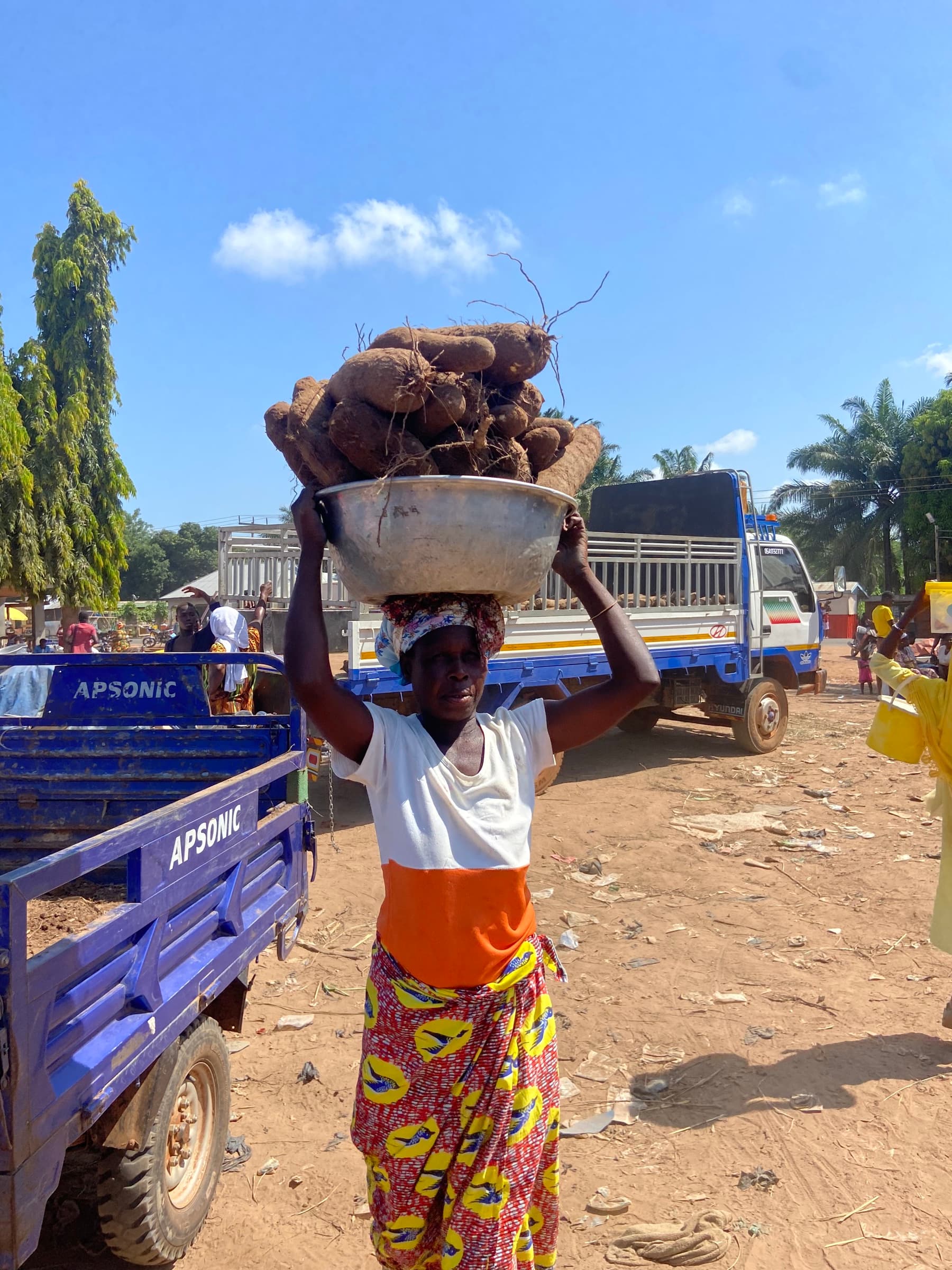 Yammie Yams sourcing team at market in Ghana